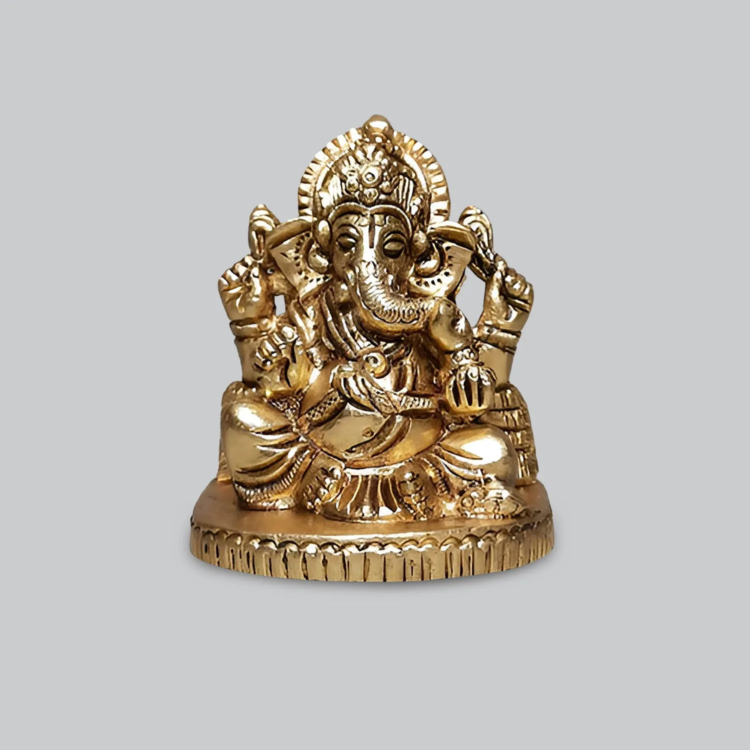 Brass Ganesha Sitting on Oval Base 2.5 in